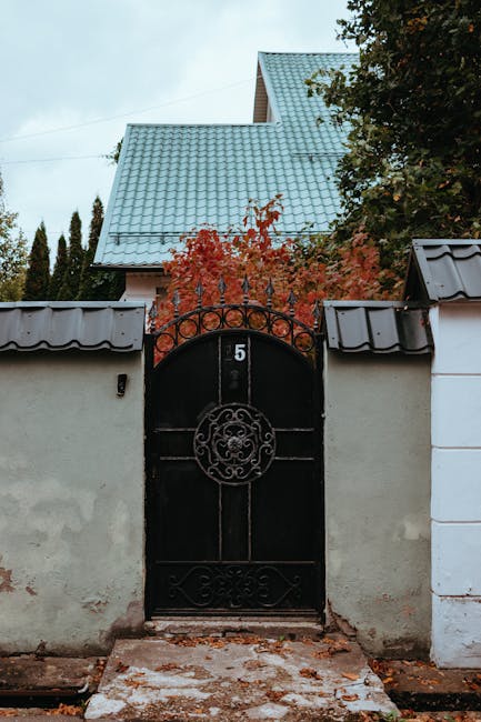 Black iron gate with number 5